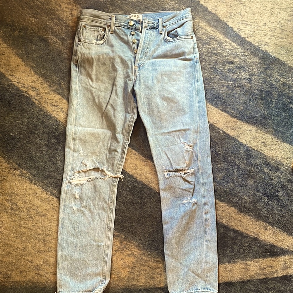 Agolde high rise button up jeans in light wash size 27 with ripped knees